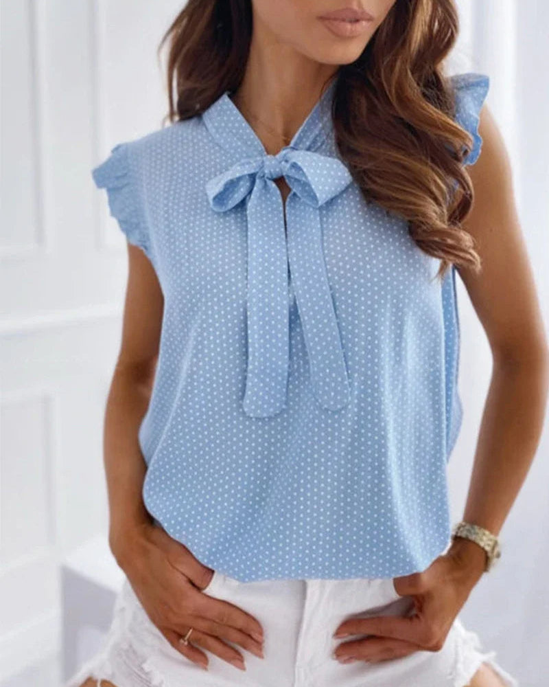 Blusa sin mangas con volantes y detalle de lazo
