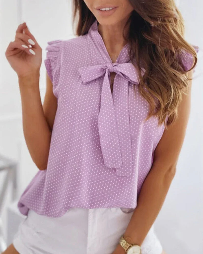 Blusa sin mangas con volantes y detalle de lazo