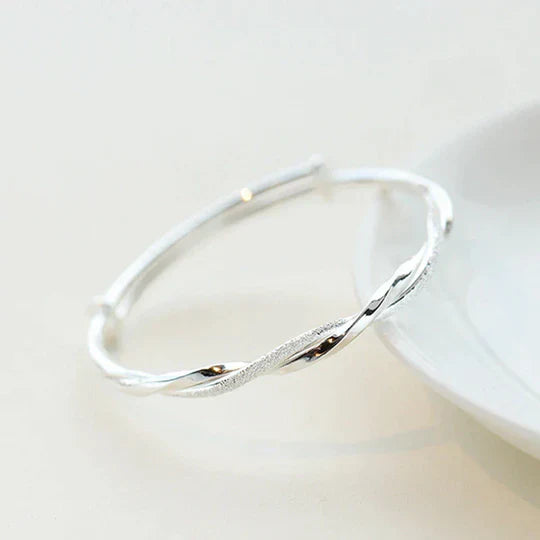 Pulsera de plata retorcida
