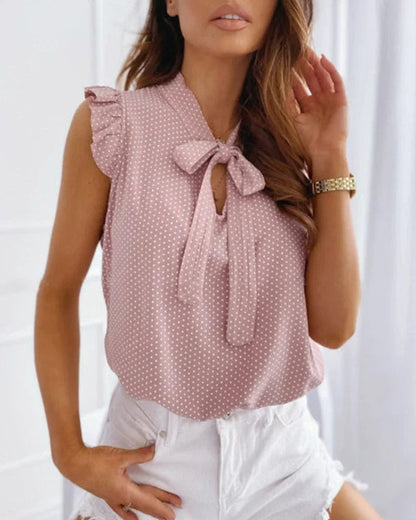 Blusa sin mangas con volantes y detalle de lazo