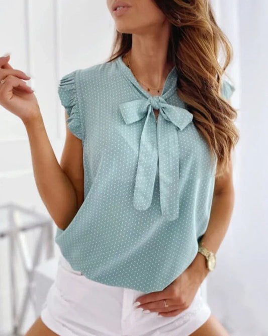 Blusa sin mangas con volantes y detalle de lazo