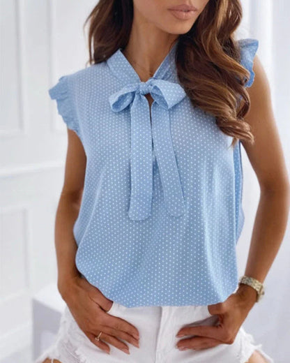 Blusa sin mangas con volantes y detalle de lazo