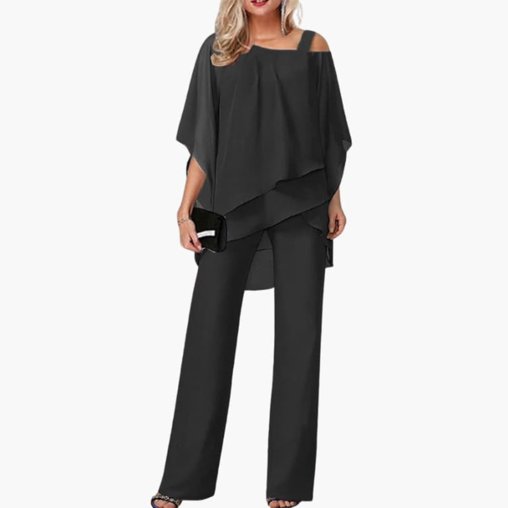 Mono de mujer con hombros descubiertos y pantalones anchos