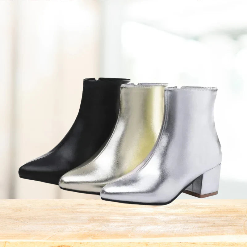 Elegantes botines plateados para mujer