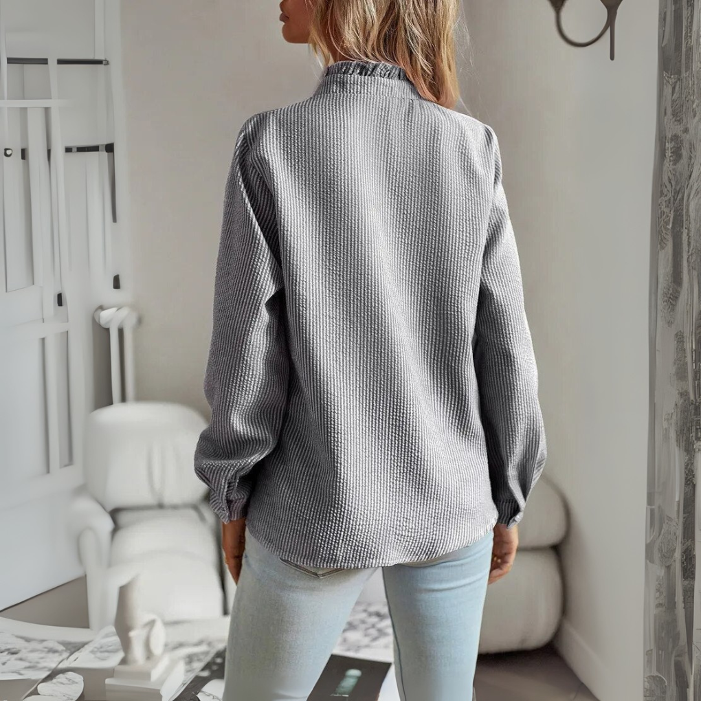 Elegante blusa de manga larga