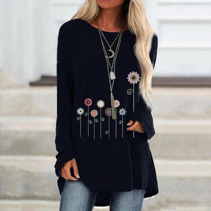 Sudadera con bordado floral en 3D: textura suave y elegancia sutil