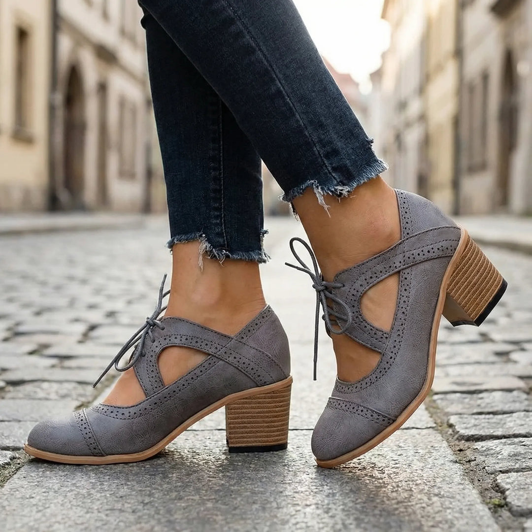 Broquella - Bota brogue con tacón de bloque y cordones