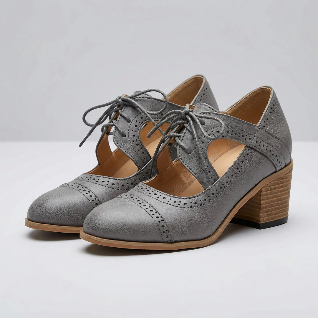 Broquella - Bota brogue con tacón de bloque y cordones