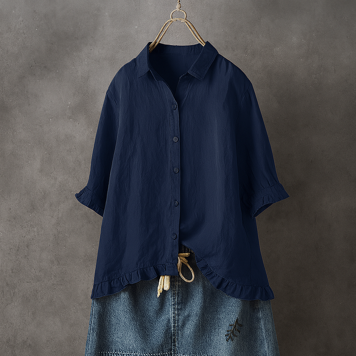 Blusa de algodón abotonada con bajo con volantes