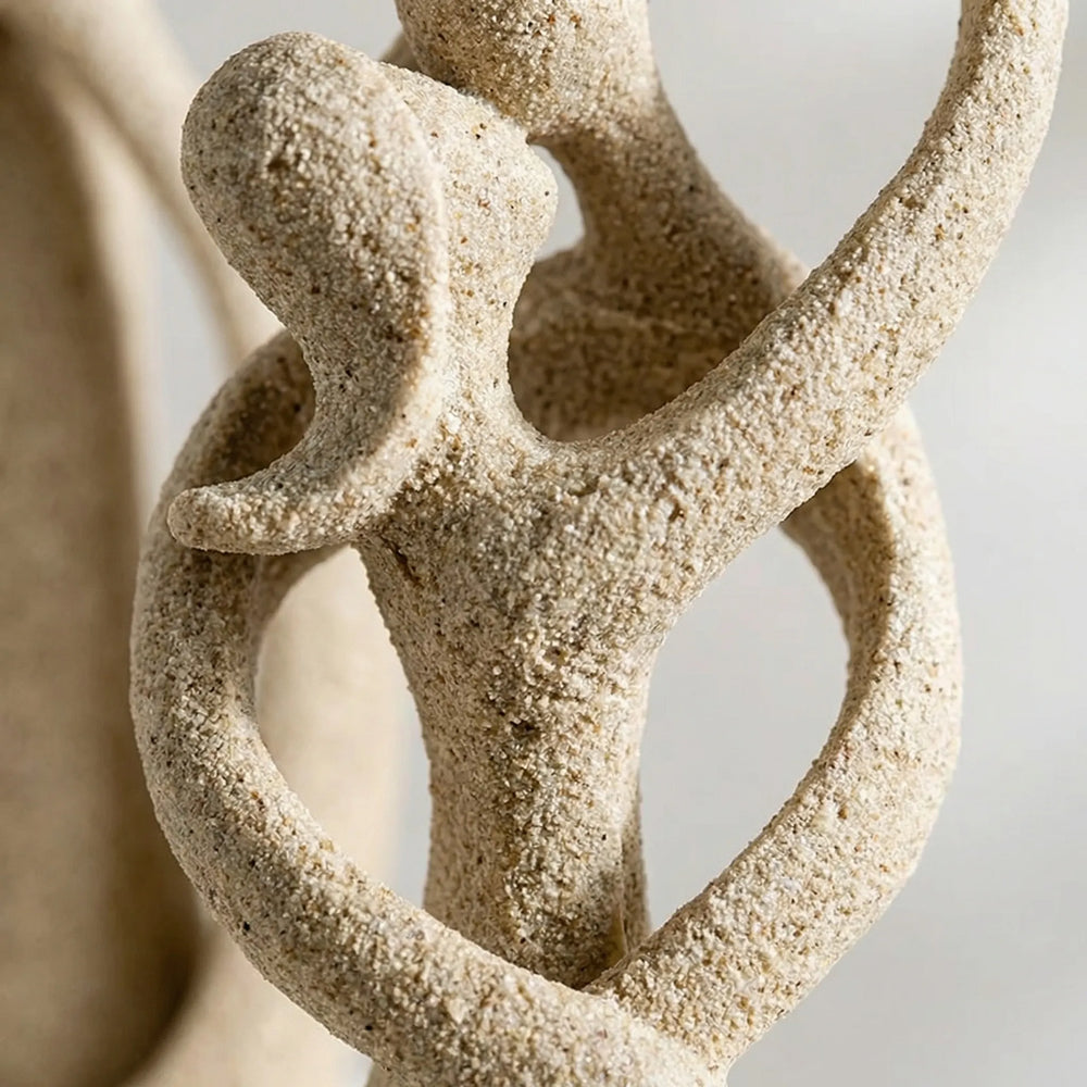 Entwinia - Figura abstracta de pareja abrazándose