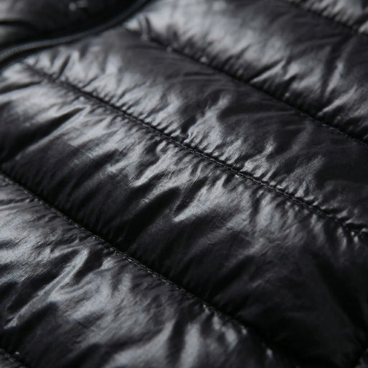 Feathrix - Abrigo acolchado ligero y plegable con capucha