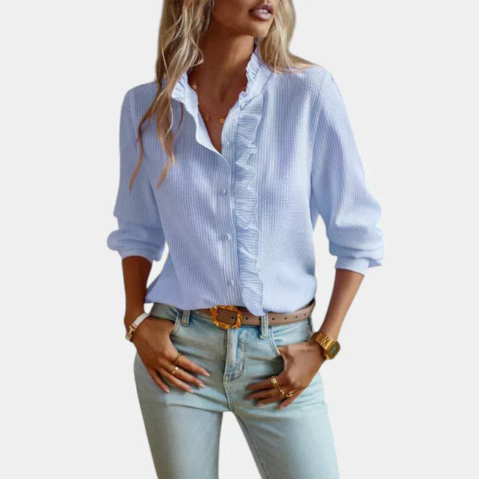 Blusa de mujer a rayas con volantes y elegante cierre de botones
