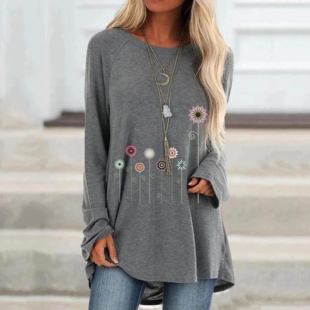 Sudadera con bordado floral en 3D: textura suave y elegancia sutil