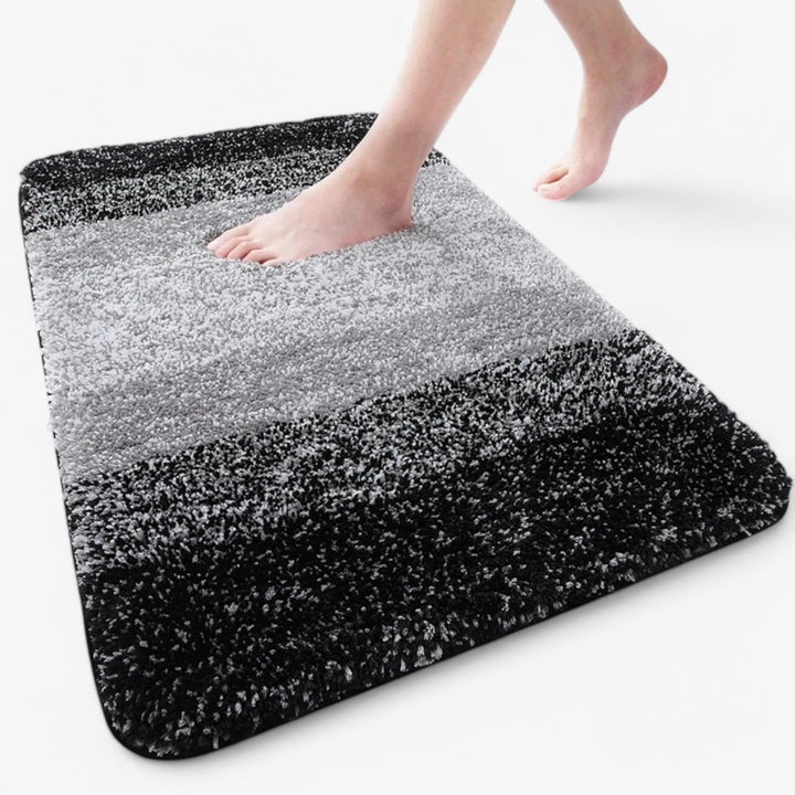 Alfombrilla de baño antideslizante y superabsorbente Corinna: comodidad y secado instantáneo