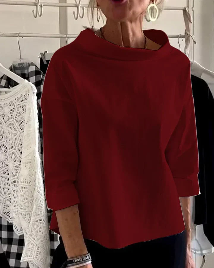 Top informal con solapas anchas y cuello de tortuga a media altura para un look elegante