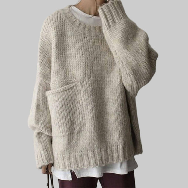 Suéter Oversized Ivory con Frente de Bolsillo – Capa Relajada para el Día a Día