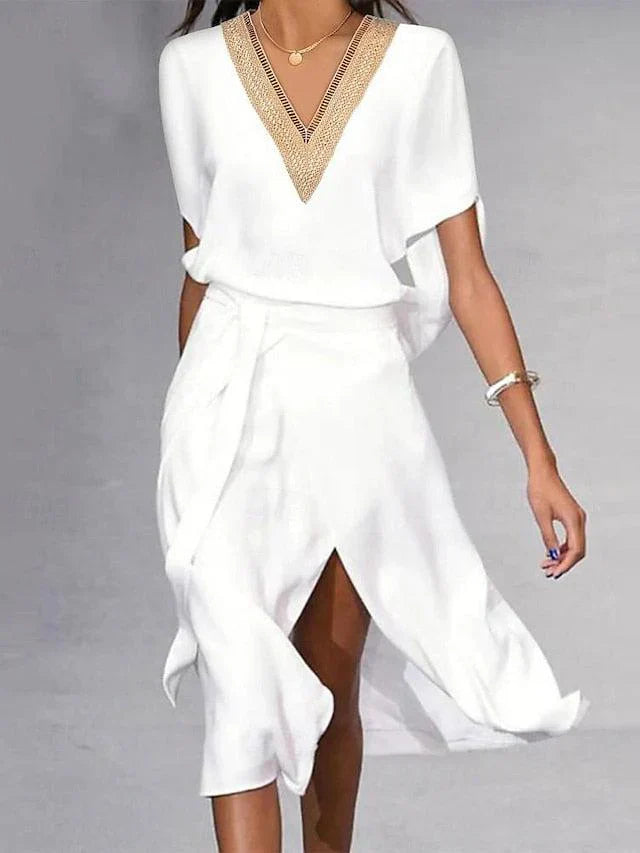 Vestido midi blanco de líneas limpias y modernas